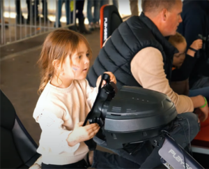 Kinderland renswoude oranjefestival koningsdag formule 1 simulator F1 meisje